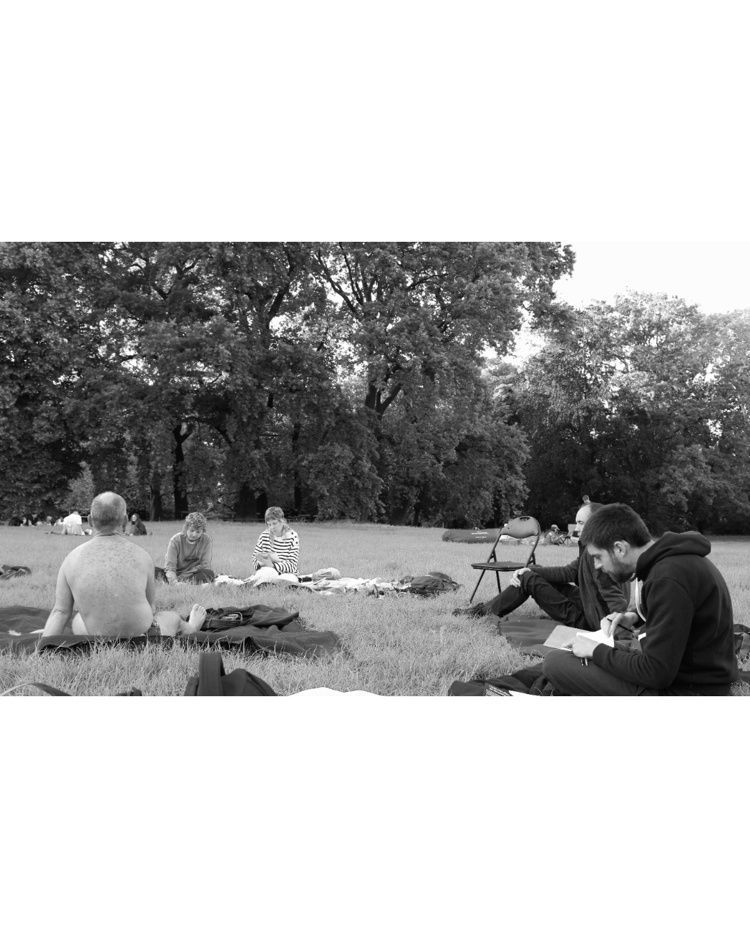 Chapter I — sketchers on the lawn behind the Lutherkirche